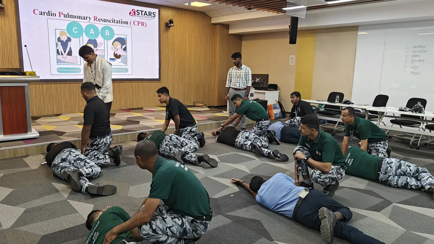 Trainees practising the recovery position