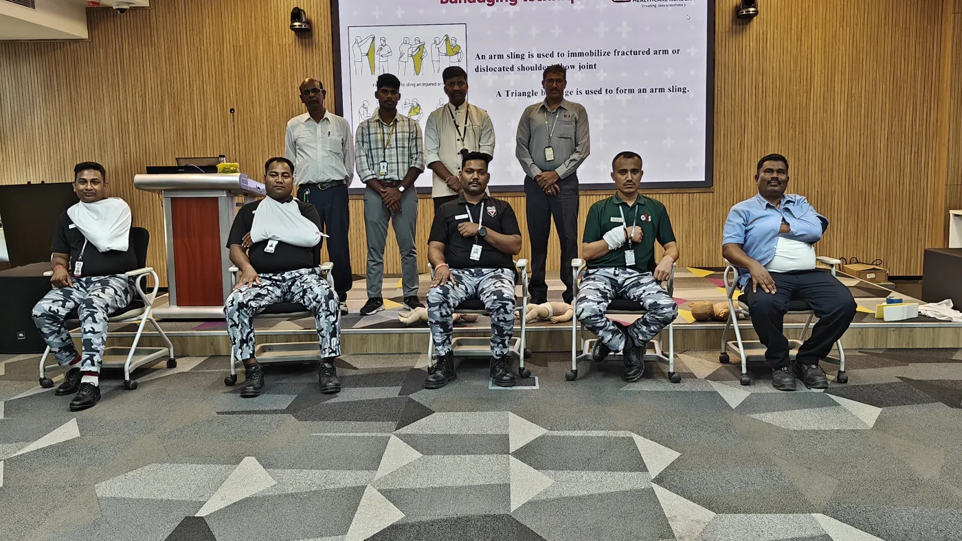 Trainees with arm slings after a bandaging exercise